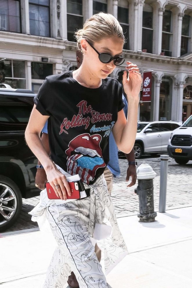 Gigi Hadid in a Rolling Stones t-shirt as she arrives home in NYC